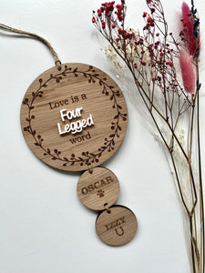 Love is a four legged word plaque