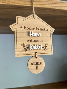 A house is not a home plaque